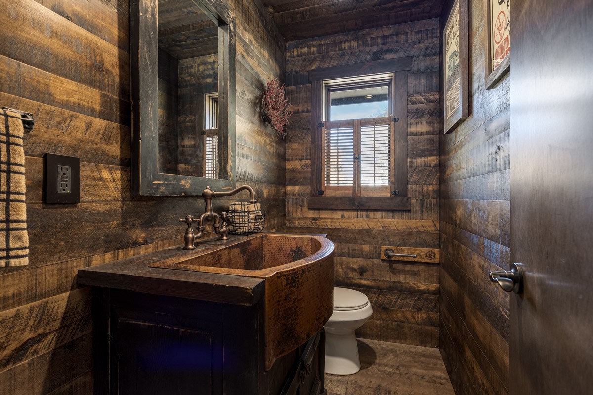 2900 Tanyard Hill Road Lynchburg, TN 37352 - Photo 33 of 83 a bathroom with a sink and a mirror