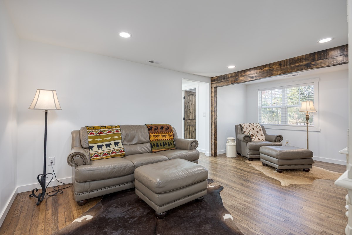 2900 Tanyard Hill Road Lynchburg, TN 37352 - Photo 64 of 83 a living room with furniture and a wooden floor