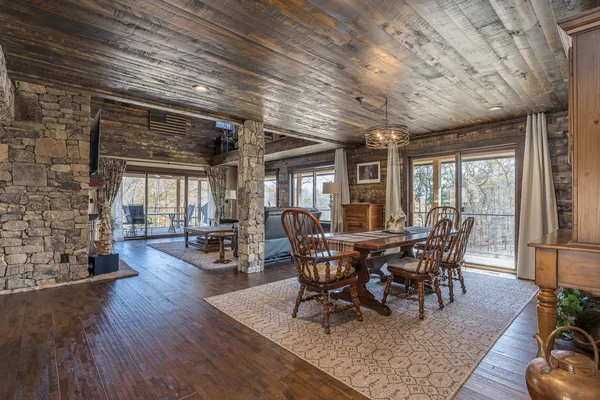 a view of an entryway with wooden floor
