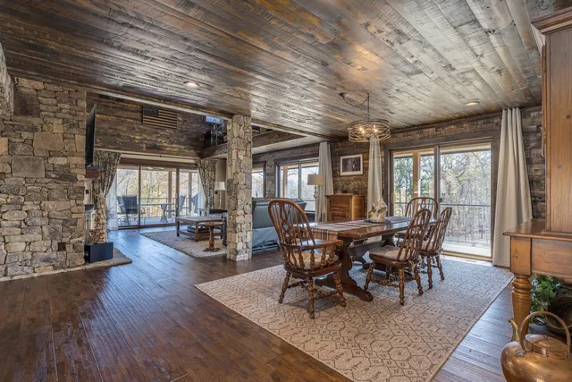 a view of an entryway with wooden floor