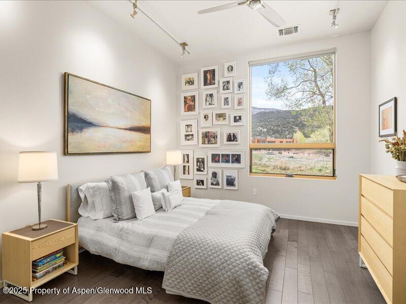 102 Evans Road, Unit 107 Basalt, CO 81621 - Photo 15 of 25 a bedroom with a bed and a window