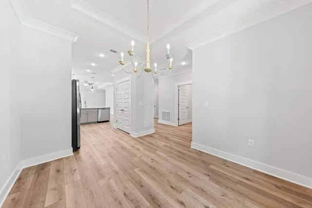a view of a livingroom with a kitchen