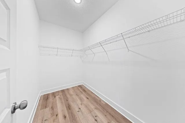 a view of a room with racks on the wall