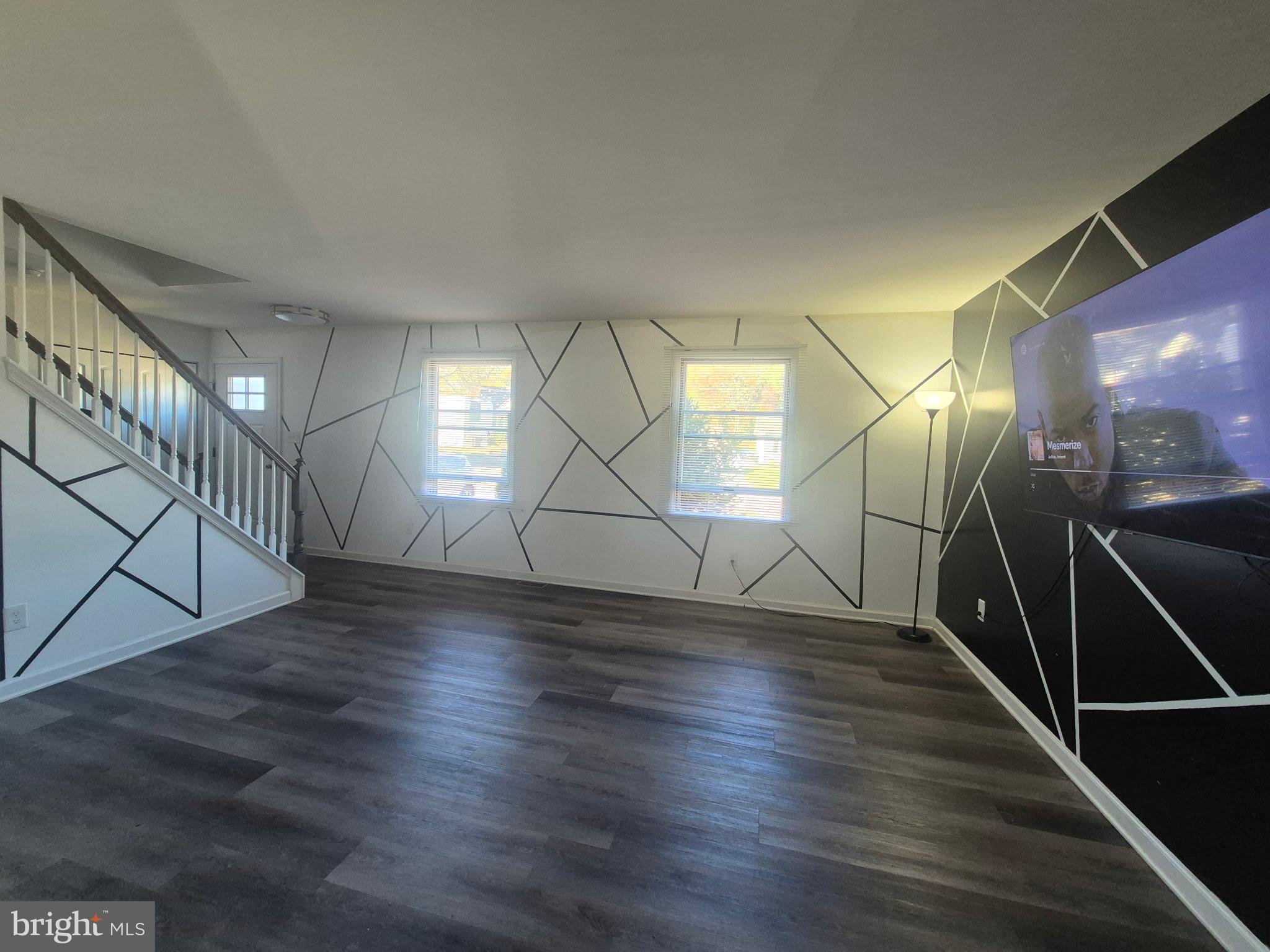 10 Carter Drive Deptford, NJ 08096 - Photo 7 of 22 an empty room with wooden floor and windows