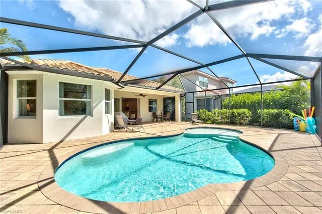 a view of a house with swimming pool