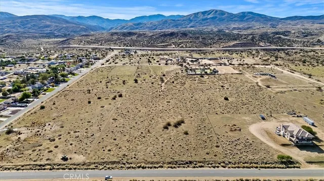 a view of a mountain with a lake view