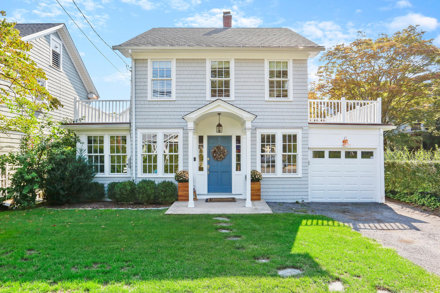 front view of a house with a yard