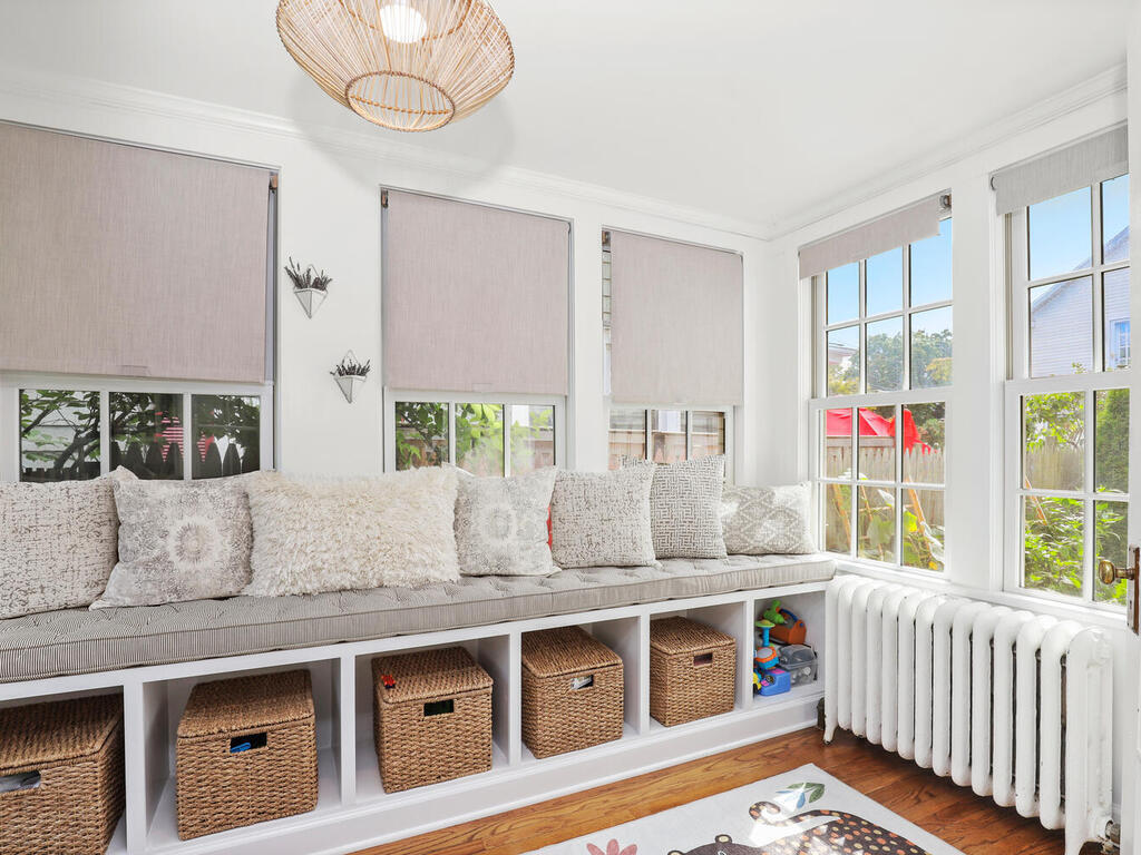 2636 Boston Post Road Darien, CT 06820 - Photo 12 of 28 a living room with stainless steel appliances kitchen island granite countertop furniture and a large window