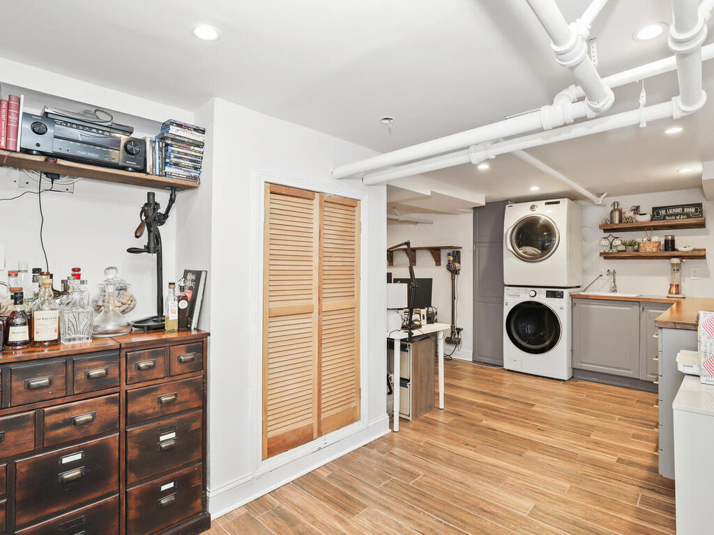 2636 Boston Post Road Darien, CT 06820 - Photo 18 of 28 walk in closet with wooden floor washer and dryer