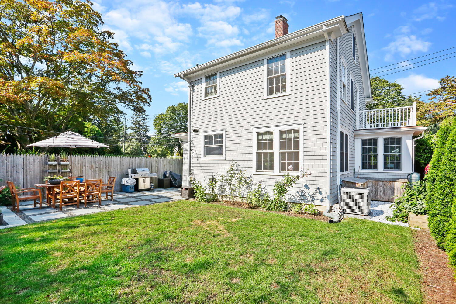 2636 Boston Post Road Darien, CT 06820 - Photo 23 of 28 a front view of a house with patio