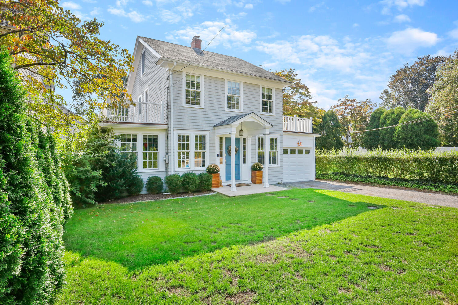 2636 Boston Post Road Darien, CT 06820 - Photo 25 of 28 front view of a house with a yard