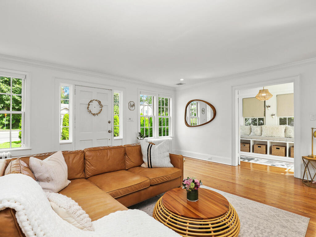 2636 Boston Post Road Darien, CT 06820 - Photo 6 of 28 a living room with furniture a rug and a window