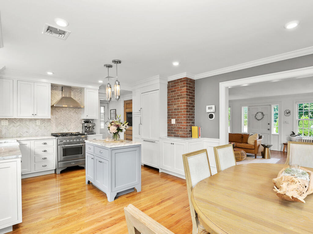 2636 Boston Post Road Darien, CT 06820 - Photo 8 of 28 a living room with stainless steel appliances granite countertop furniture wooden floor and a kitchen view