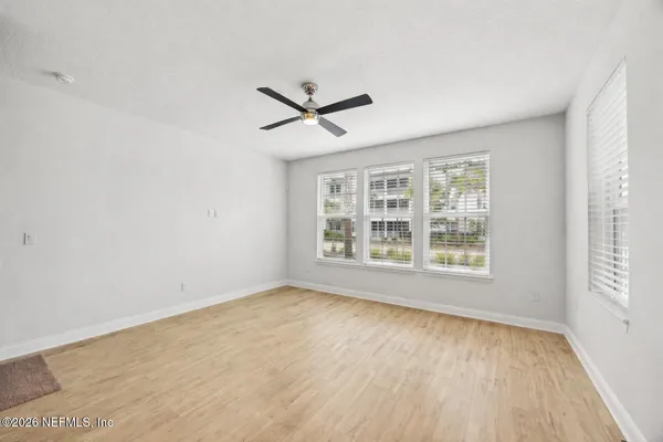 a bathroom with a sink and a window
