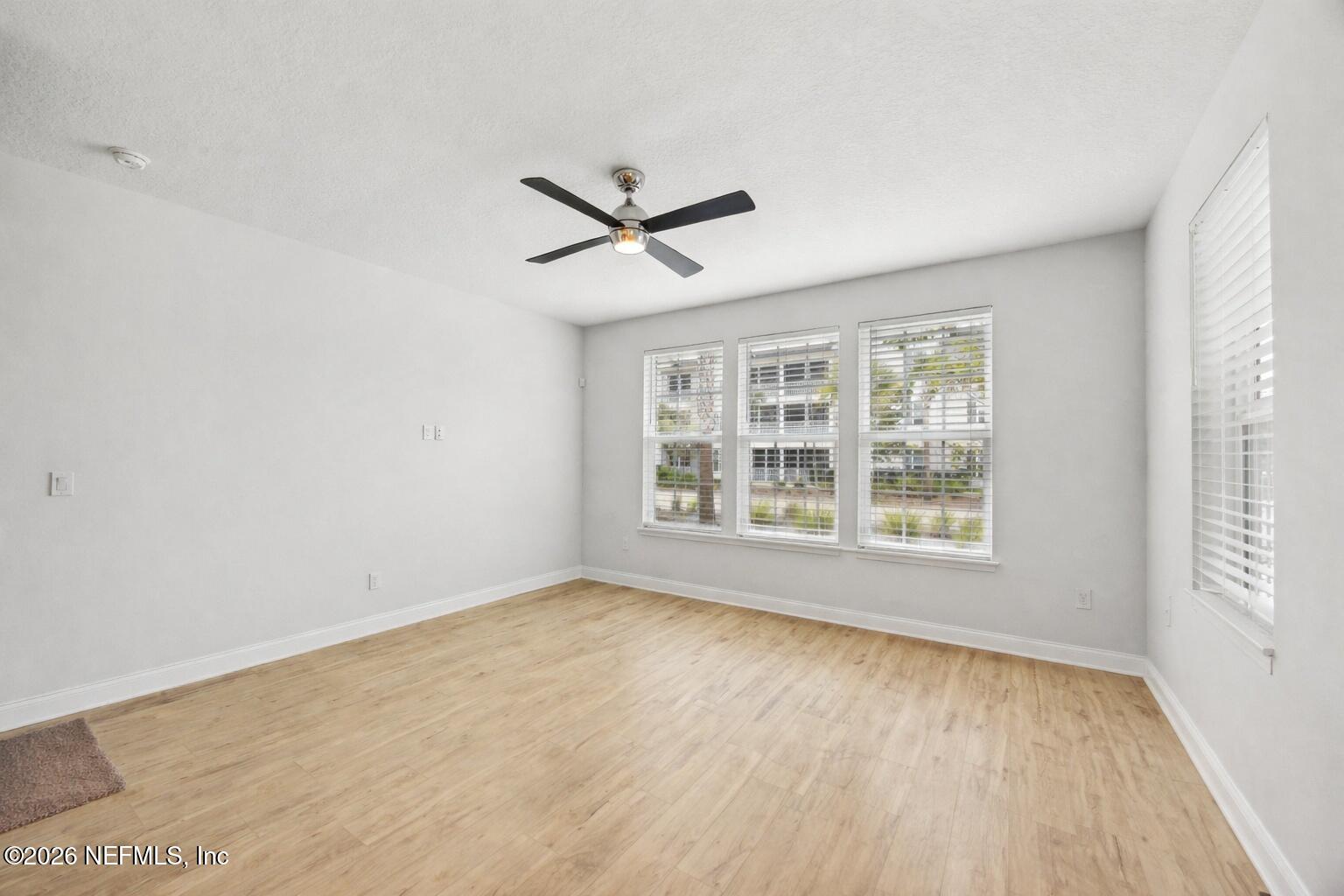 230 Wildlight Avenue Yulee, FL 32097 - Photo 7 of 73 A_digital_photograph_showcases_a_spaciou