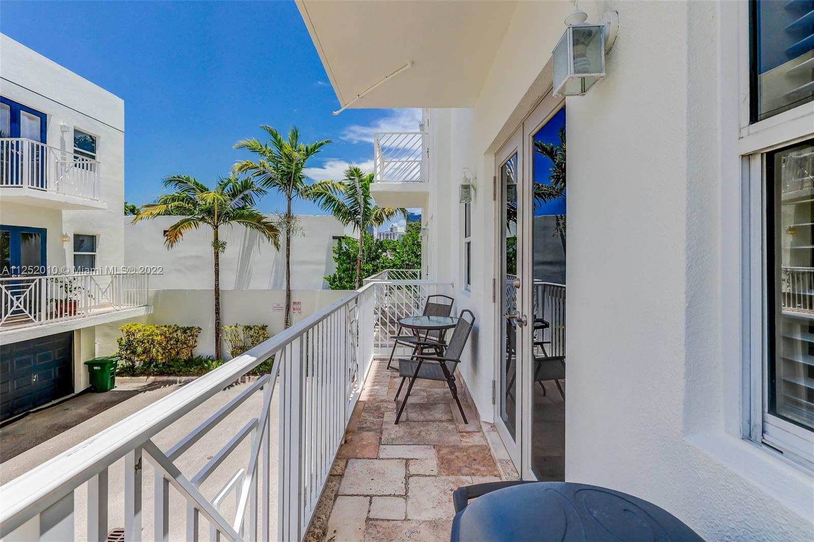 1037 Southwest 9th Court, Unit E1 Miami, FL 33130 - Photo 18 of 26 a view of balcony and patio