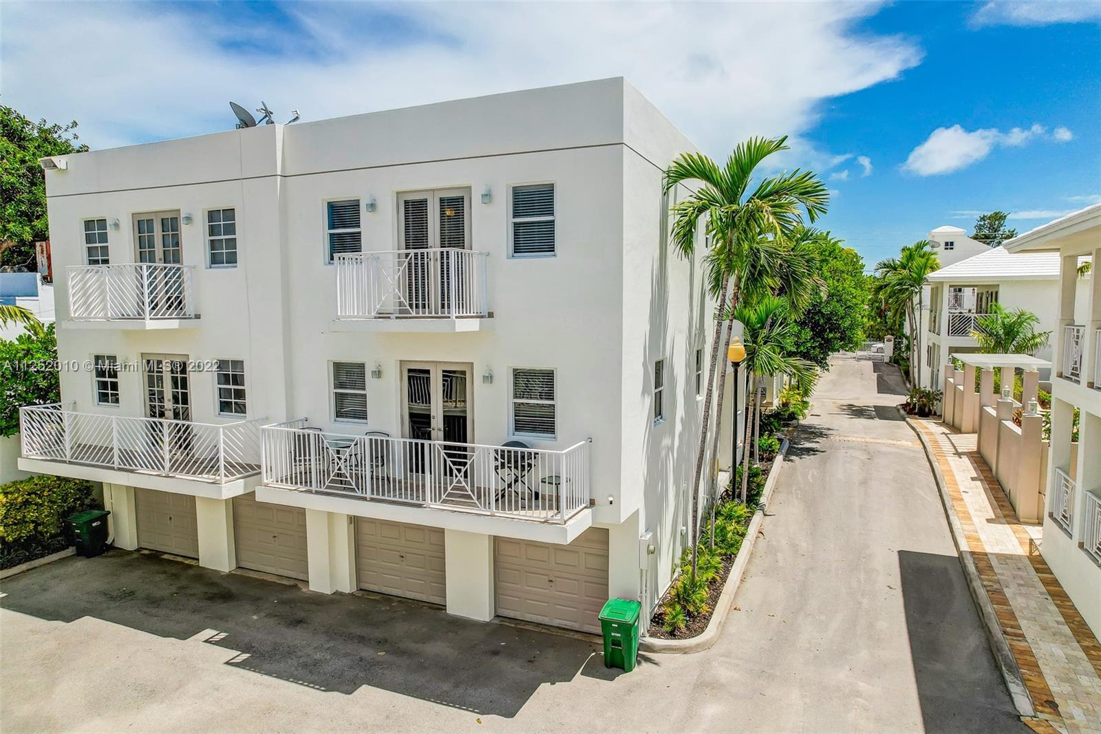 1037 Southwest 9th Court, Unit E1 Miami, FL 33130 - Photo 23 of 26 a view of balcony with couple of potted plants