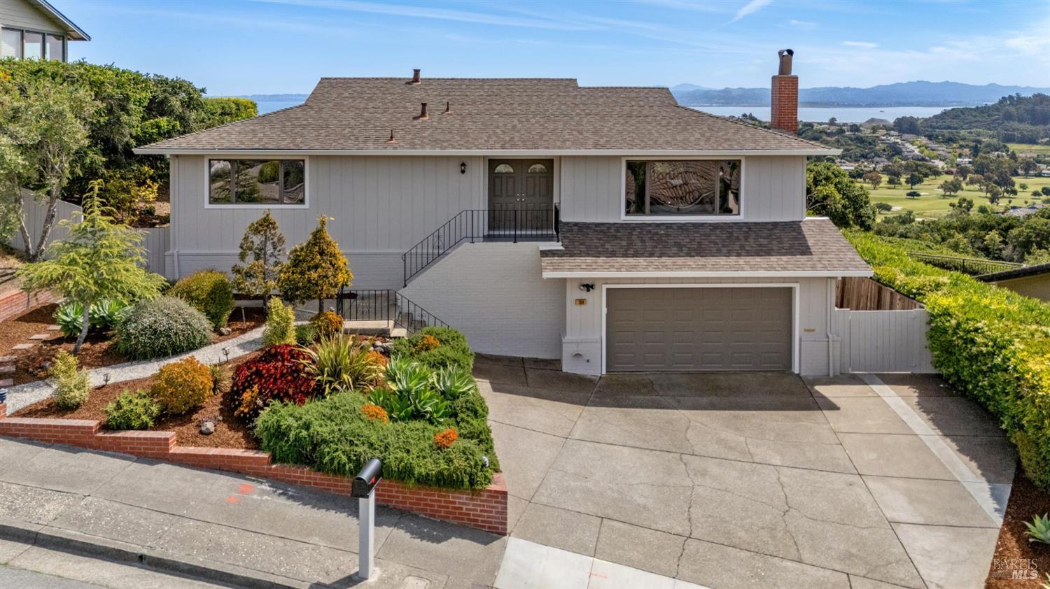184 McNear Drive San Rafael, CA 94901 - Photo 1 of 1 front view of a house with a yard