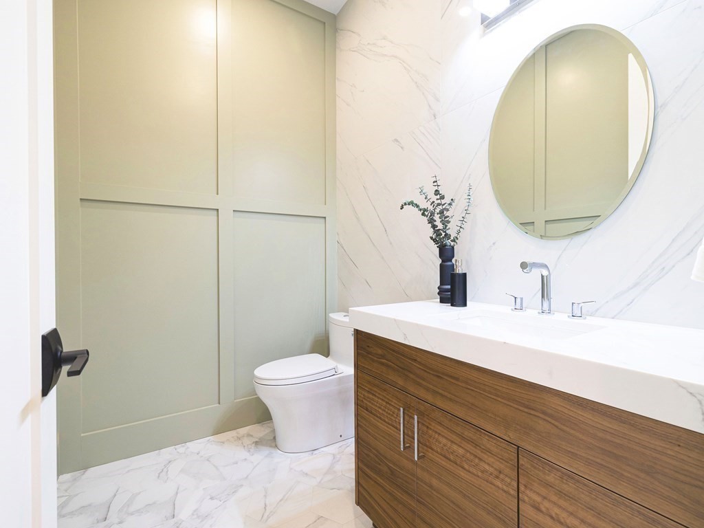 20 Bound Brook Road Newton, MA 02461 - Photo 20 of 40 a bathroom with a sink and a mirror