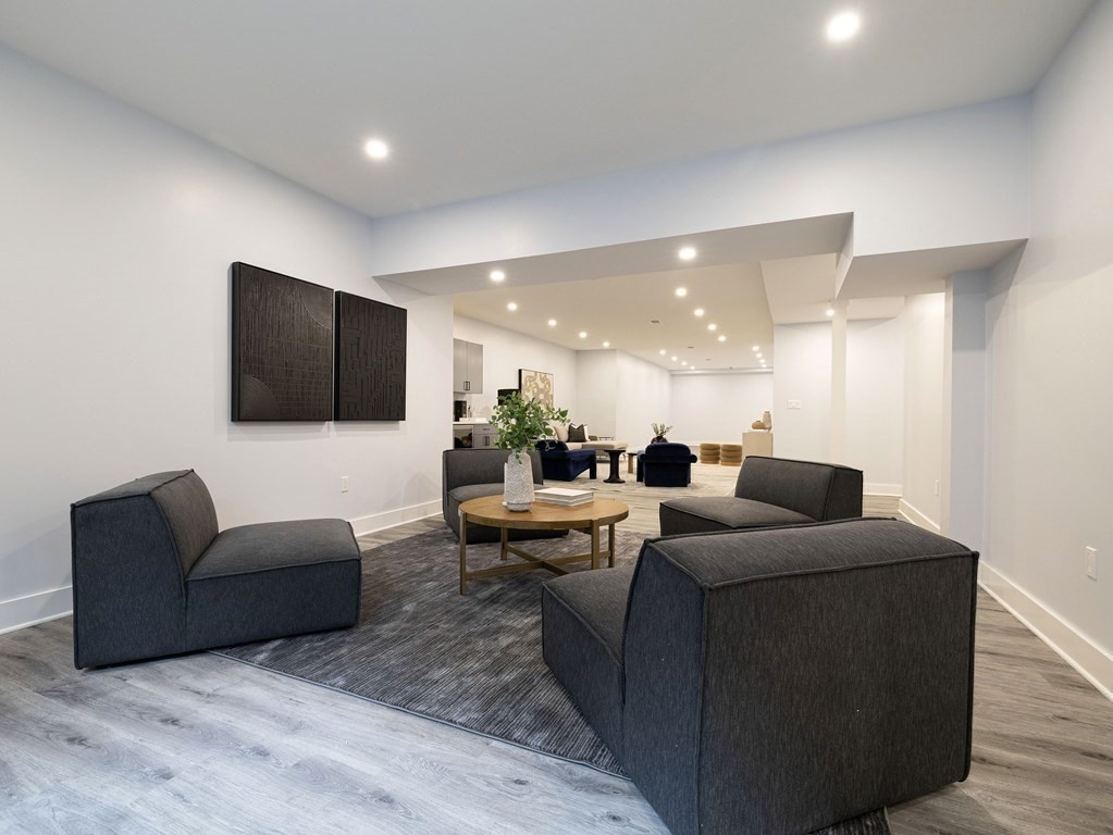 20 Bound Brook Road Newton, MA 02461 - Photo 34 of 40 a living room with furniture and a flat screen tv