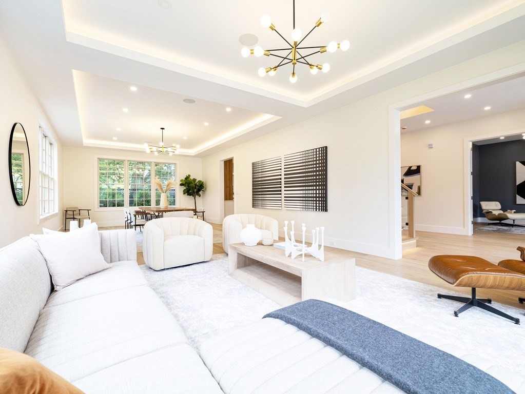 20 Bound Brook Road Newton, MA 02461 - Photo 7 of 40 a living room with furniture and a flat screen tv