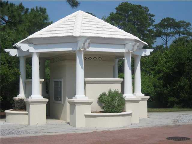 Lot 8 White Cliffs Boulevard Santa Rosa Beach, FL 32459 - Photo 19 of 23 a view of a white house with plants