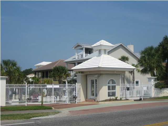 Lot 8 White Cliffs Boulevard Santa Rosa Beach, FL 32459 - Photo 20 of 23 a front view of a house with a garden
