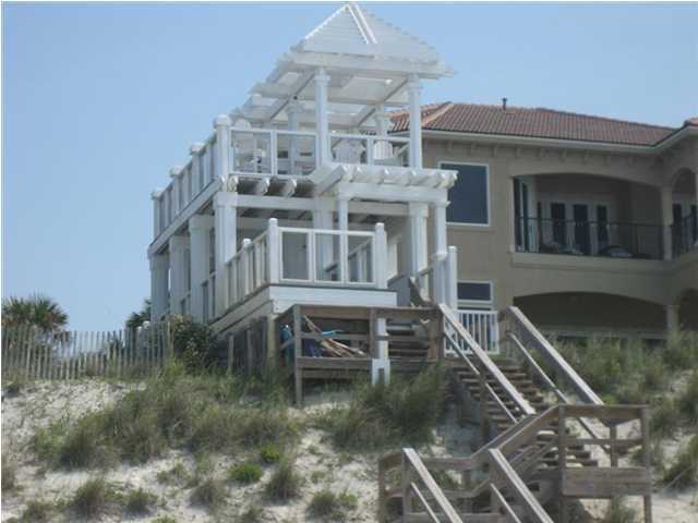 Lot 8 White Cliffs Boulevard Santa Rosa Beach, FL 32459 - Photo 23 of 23 a view of a brick house with many windows