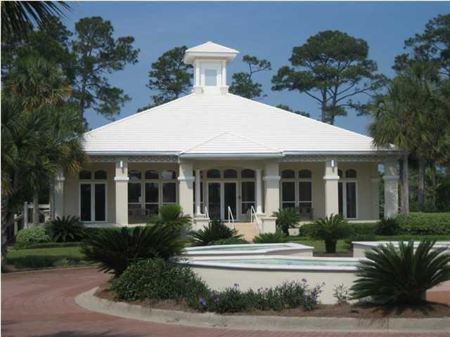 Lot 8 White Cliffs Boulevard Santa Rosa Beach, FL 32459 - Photo 7 of 23 a front view of a house with a yard