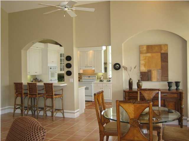 Lot 8 White Cliffs Boulevard Santa Rosa Beach, FL 32459 - Photo 10 of 23 a dining room with furniture and wooden floor