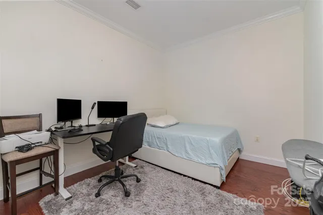 a view of a workspace with furniture