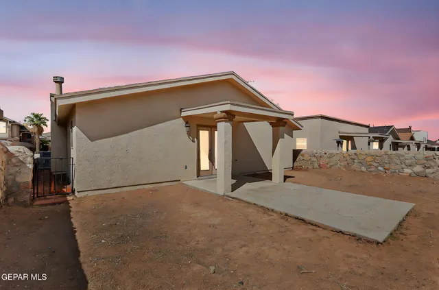 an aerial view of residential house with outdoor space