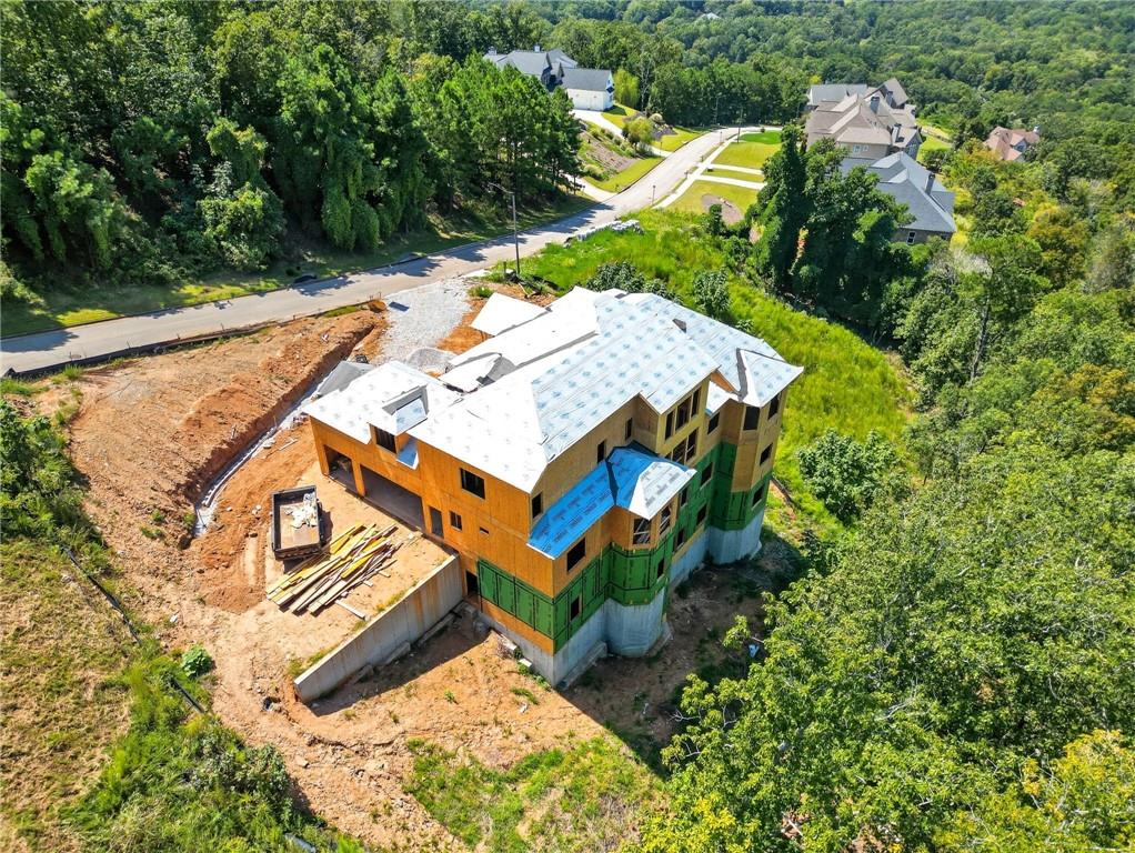 5010 Pindos Trail Southwest Powder Springs, GA 30127 - Photo 15 of 26 an aerial view of a house with a yard and garden