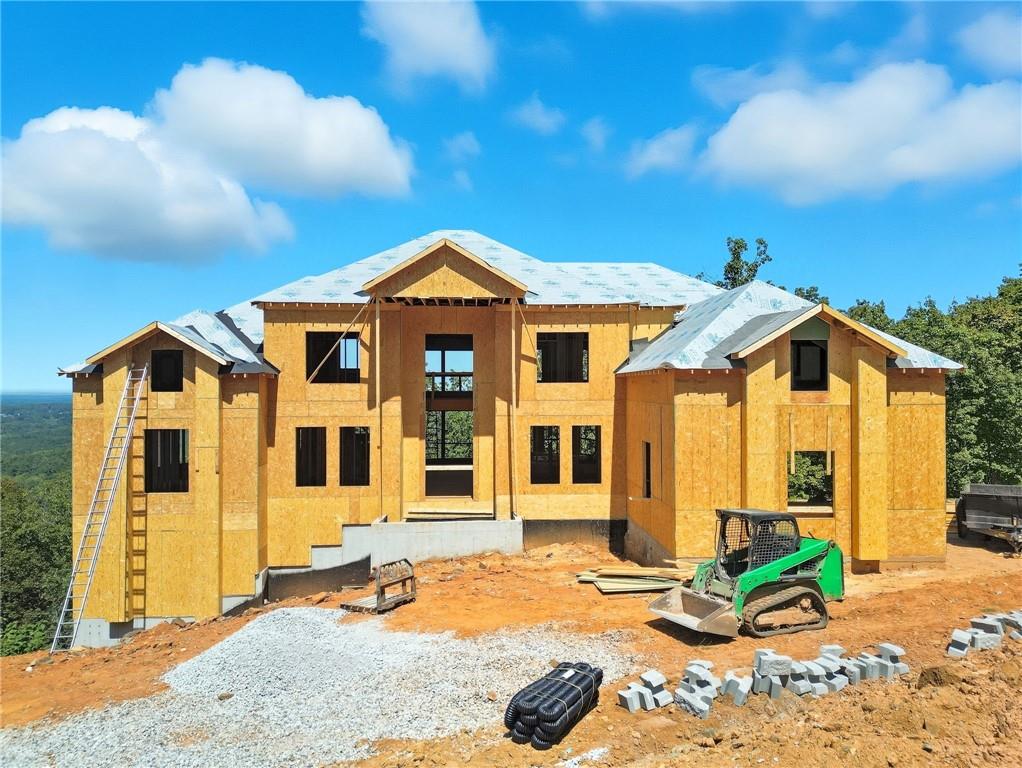5010 Pindos Trail Southwest Powder Springs, GA 30127 - Photo 8 of 26 a front view of a house with a yard