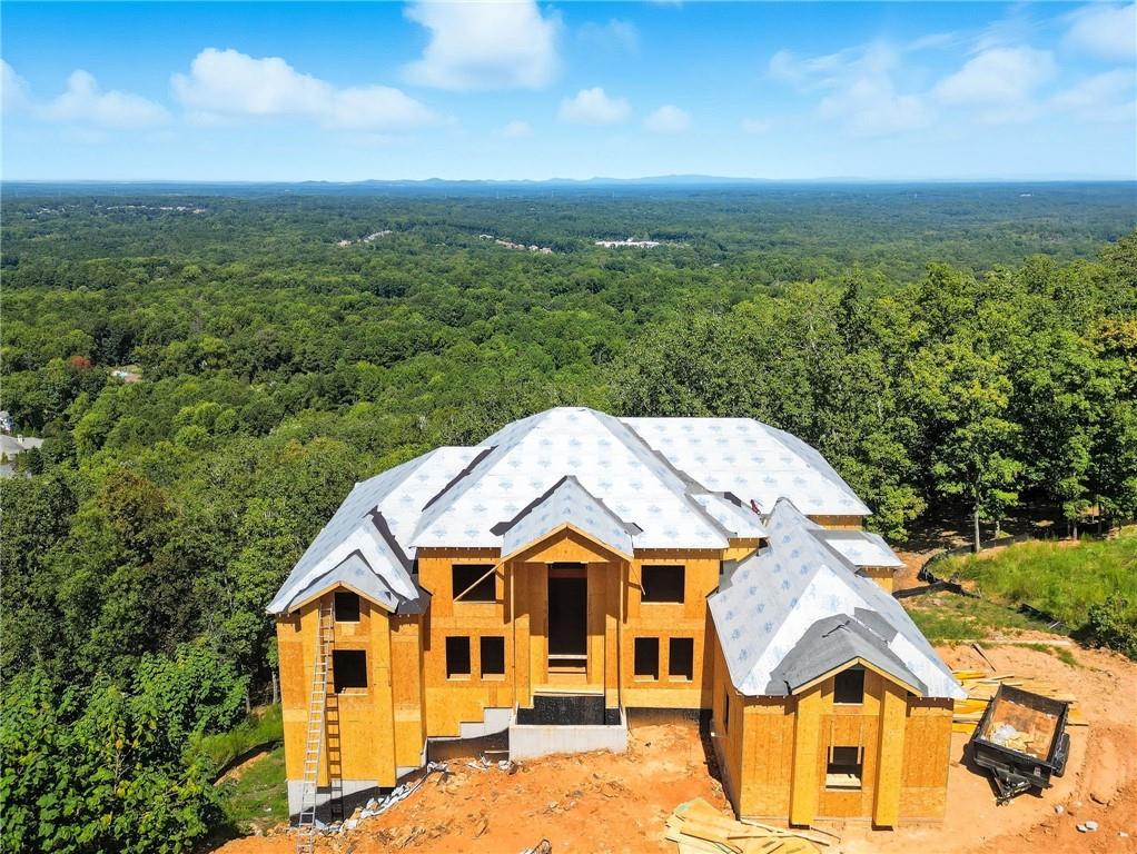 5010 Pindos Trail Southwest Powder Springs, GA 30127 - Photo 9 of 26 an aerial view of residential houses with outdoor space and trees
