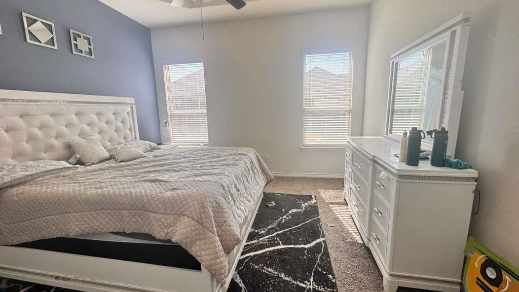 3935 Sidney Lane Forney, TX 75126 - Photo 4 of 4 a bedroom with a bed and a window