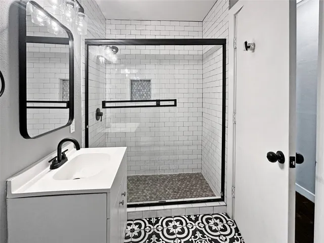 a sign that is sitting on a wooden floor