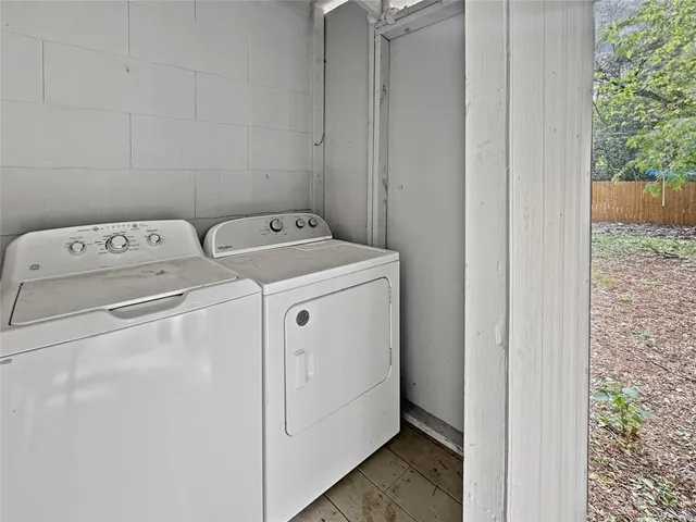 a view of a yard with swimming pool