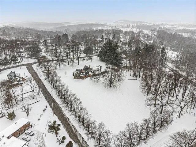 a view of a terrace with snow on the road