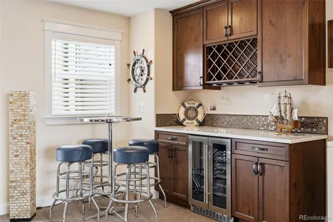 a kitchen with a sink cabinets and window