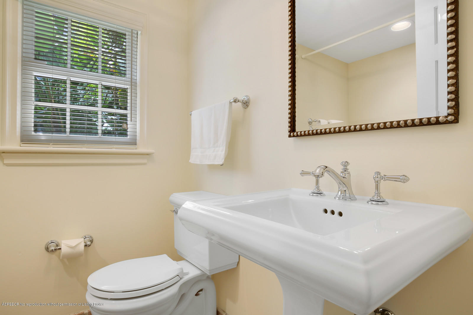 133 Gulfstream Road Palm Beach, FL 33480 - Photo 15 of 20 a bathroom with a sink and a toilet