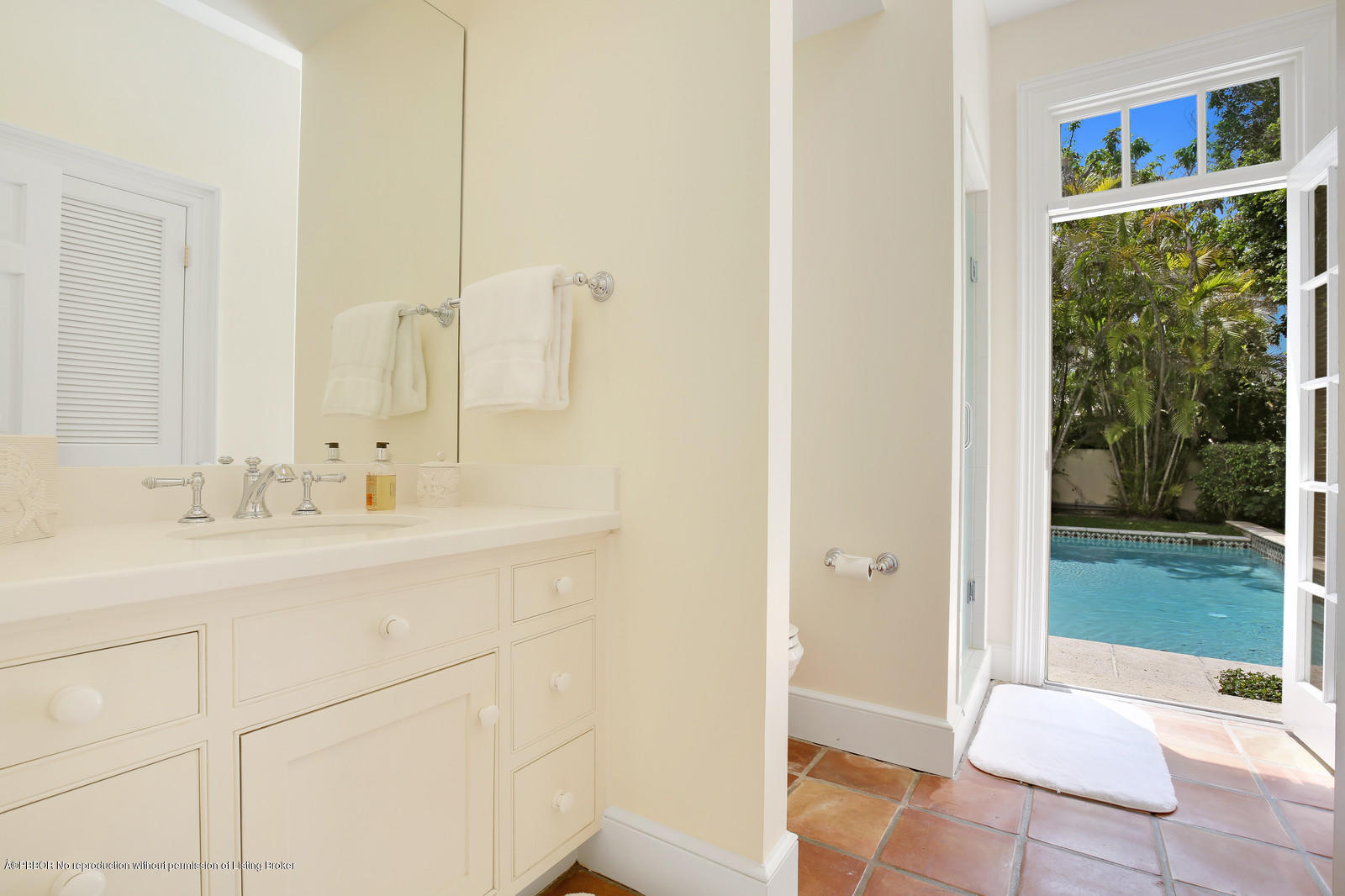 133 Gulfstream Road Palm Beach, FL 33480 - Photo 17 of 20 a bathroom with a sink and a mirror