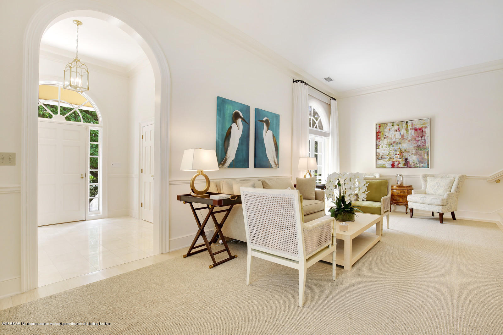 133 Gulfstream Road Palm Beach, FL 33480 - Photo 3 of 20 a living room with furniture and a painting on the wall