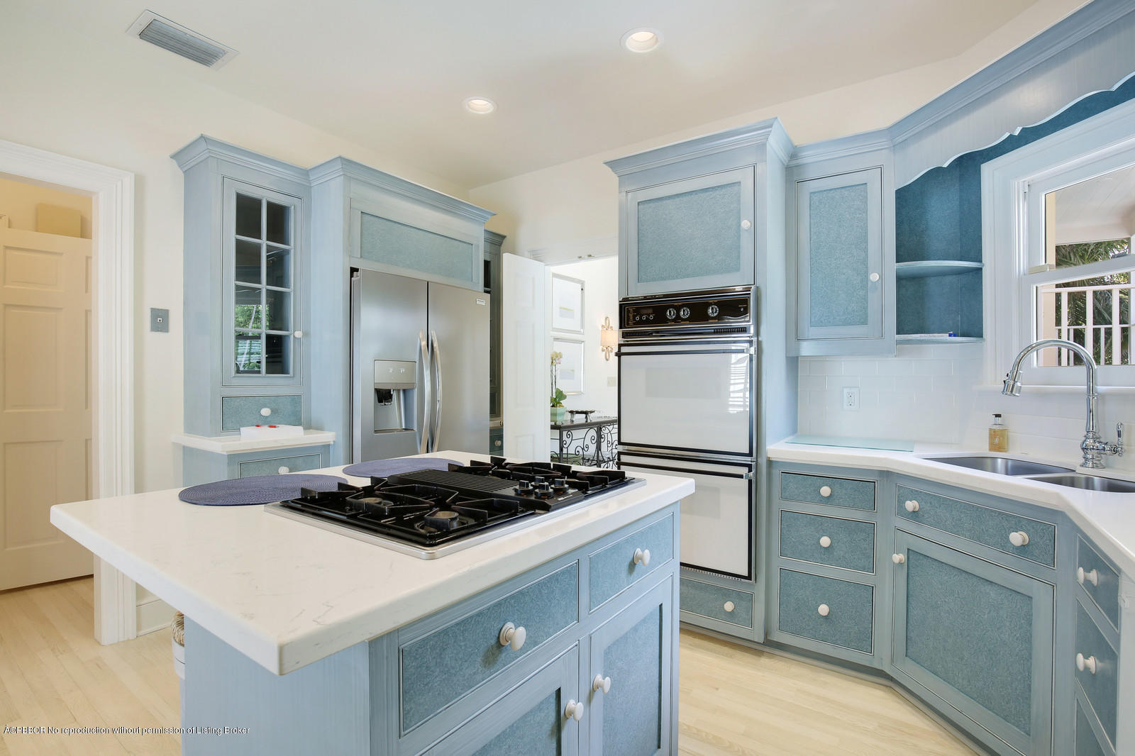 133 Gulfstream Road Palm Beach, FL 33480 - Photo 7 of 20 a kitchen with a refrigerator stove and sink