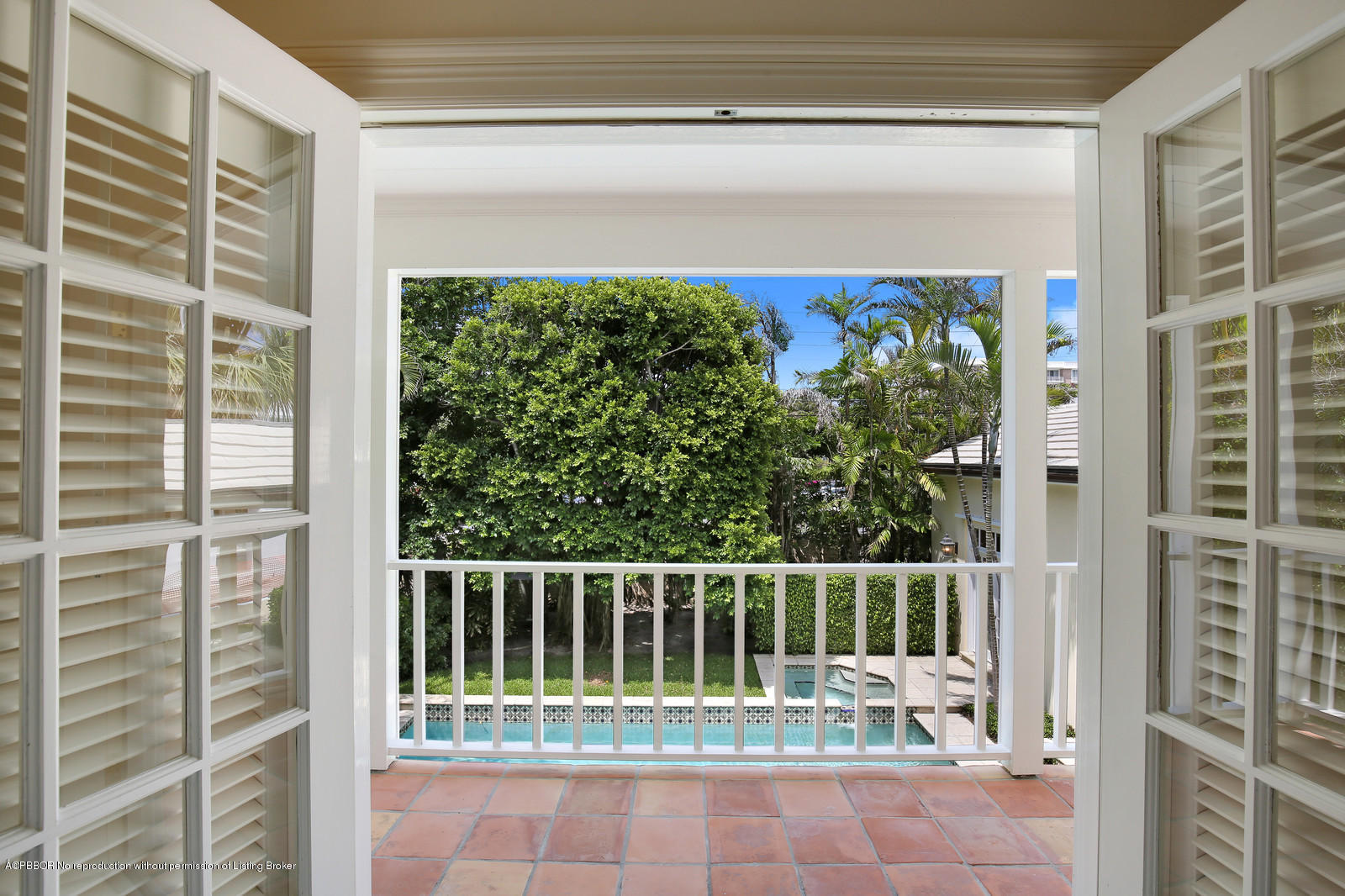 133 Gulfstream Road Palm Beach, FL 33480 - Photo 9 of 20 a view of a wooden door and a window