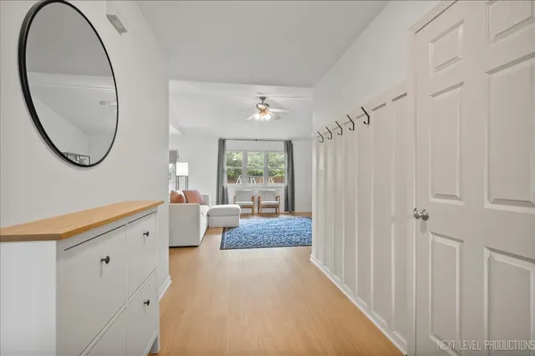 a spacious bathroom with a mirror and a bathtub