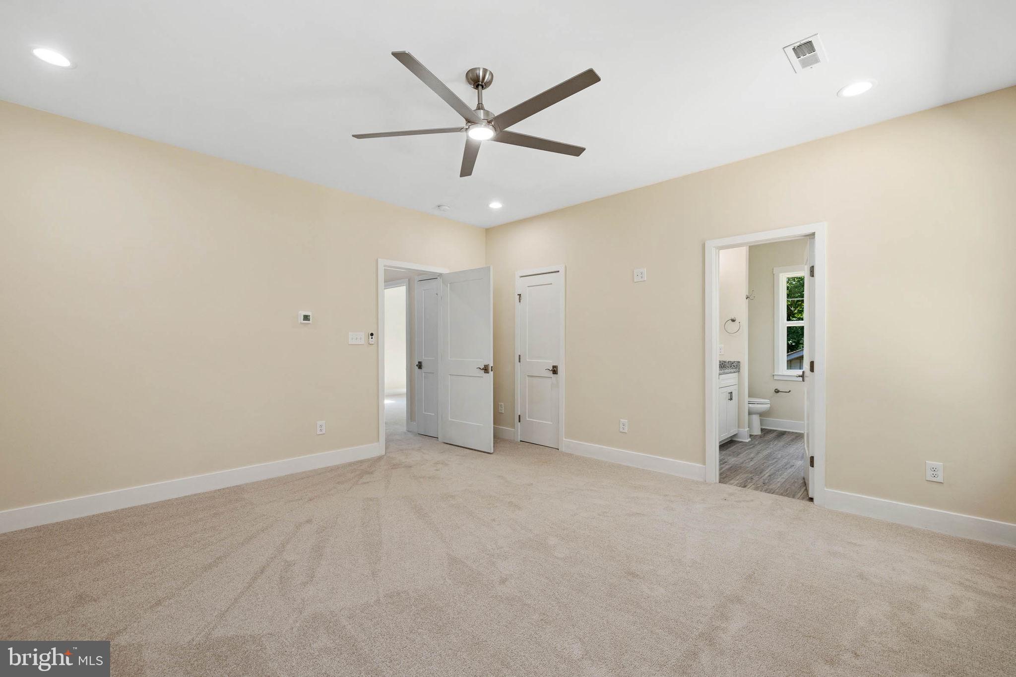 418 Birdie Road Locust Grove, VA 22508 - Photo 50 of 59 Owners Suite with walk in closet & luxury bath