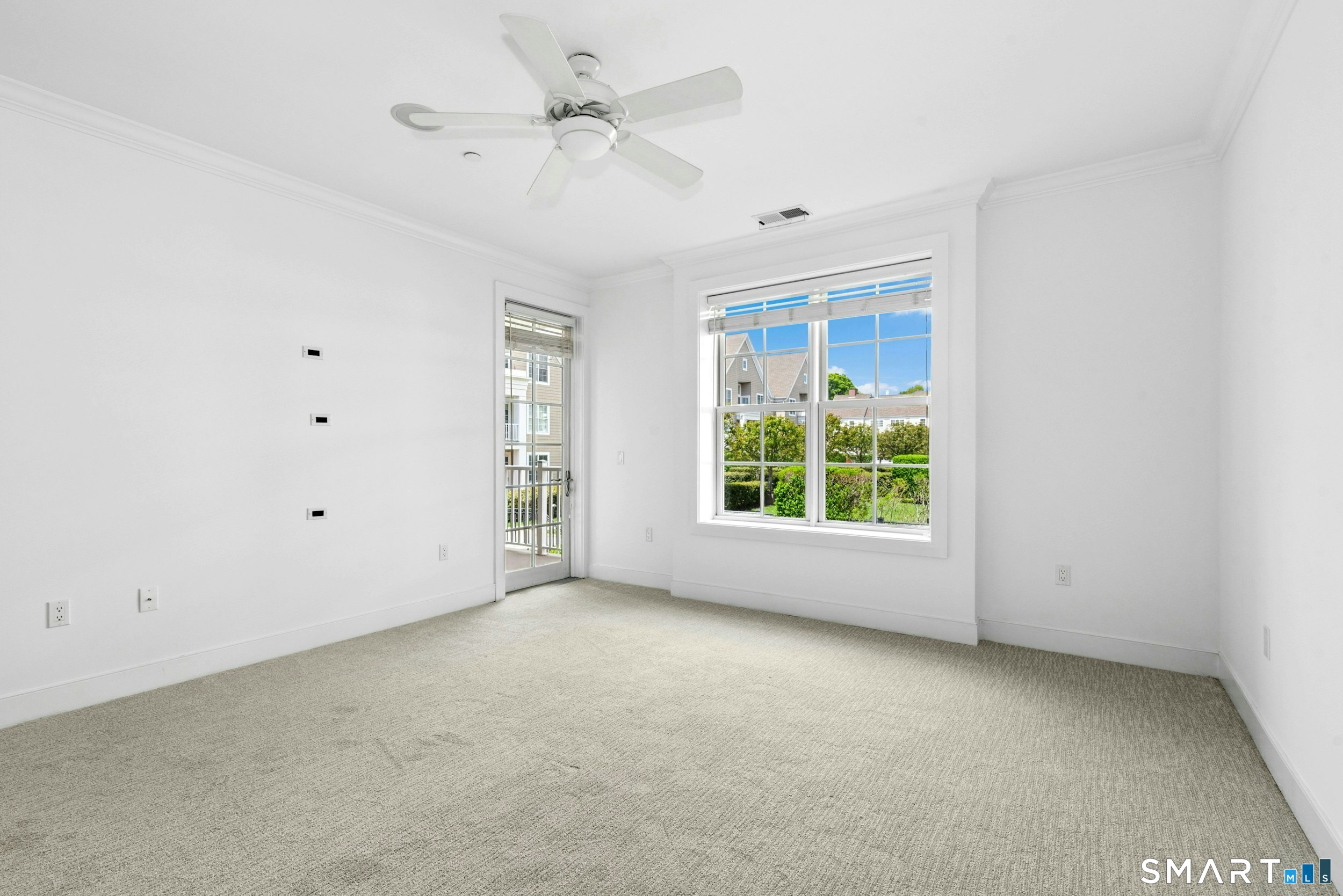 77 Havemeyer Lane, Unit 310 Stamford, CT 06902 - Photo 11 of 22 a view of room with window and ceiling fan