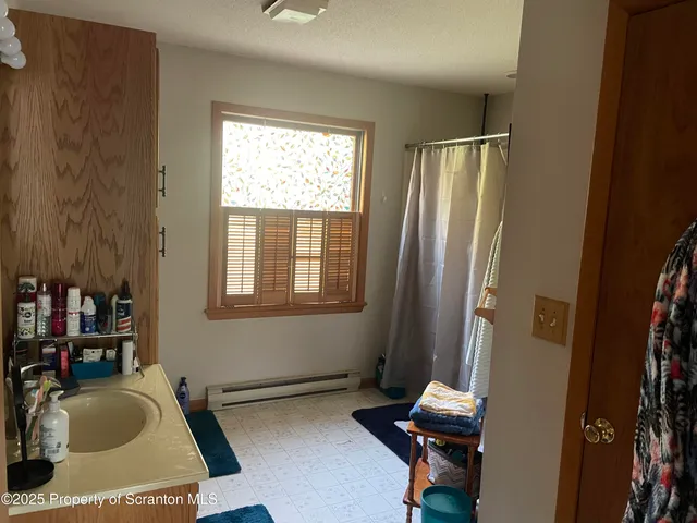 a room with window closet and couch