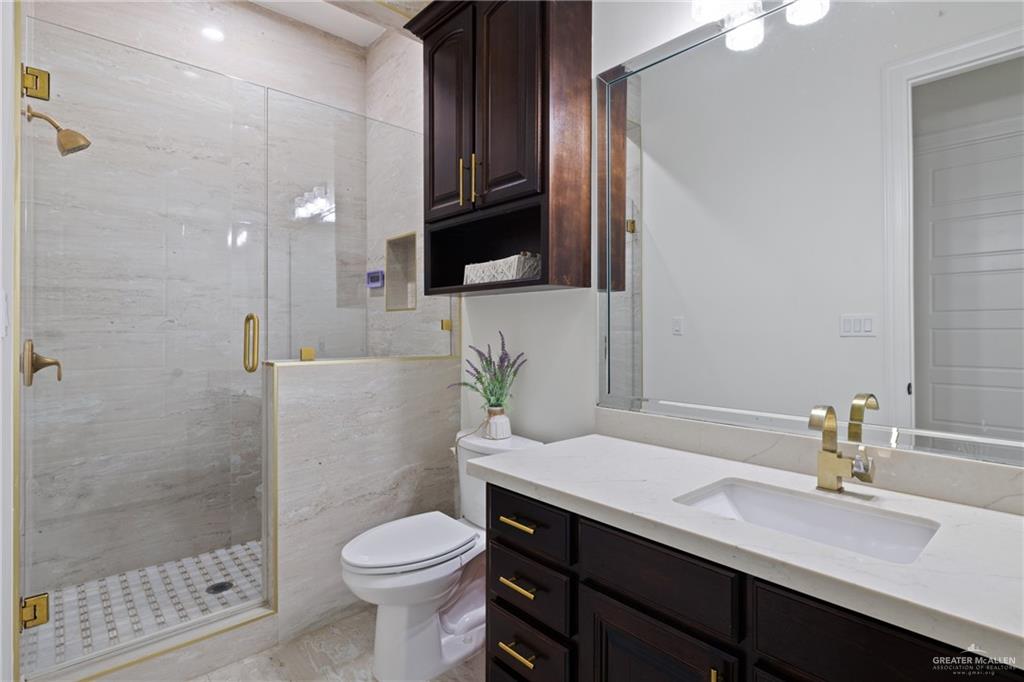 22303 Uresti Road Edinburg, TX 78542 - Photo 14 of 22 Full bath featuring vanity and a shower stall